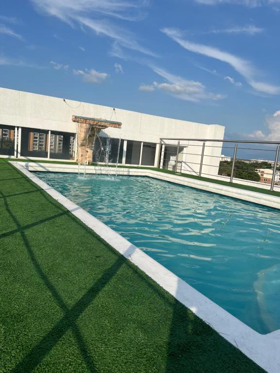 Aparta Suites La Flora- Infinity Living